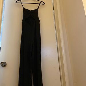 black ribbed jumpsuit with a slight flare bottom never worn